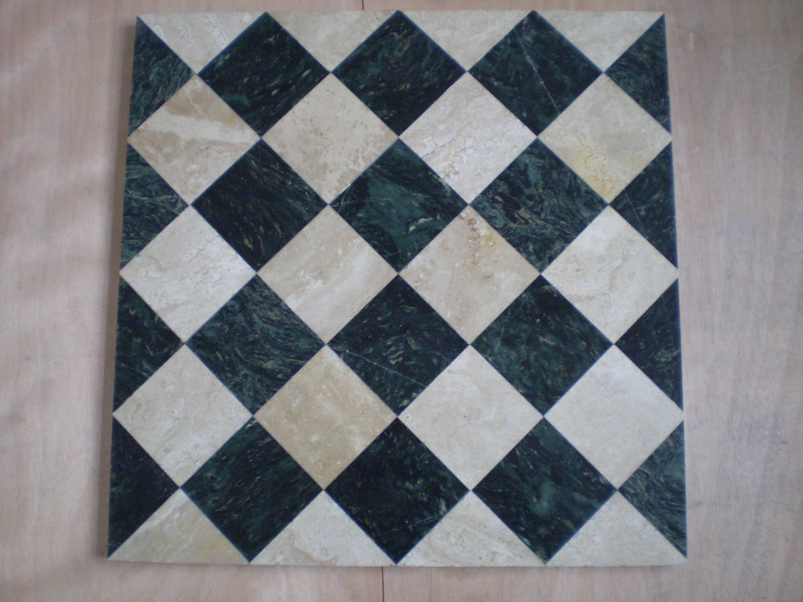 What Color Stone Mosaic Tiles Match Carrara Marble Bathroom Panels?
